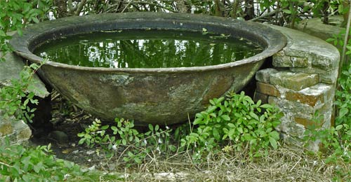 Cauldron for boiling down cane syrup at Watson's Place.