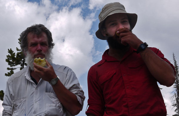 Dan and Tamir eating New Year apples.