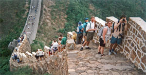 The old style Great wall is in the foreground, the new tourist wall in the distance.