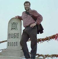 Here I am atop one of the sacred peaks. Note all the lucky padlocks on the chainrail behind me.