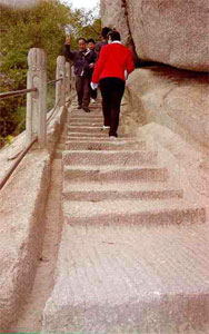 These steps and the rain gutter are carved out of solid rock.