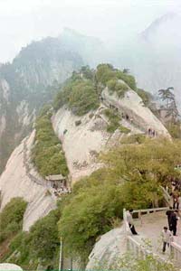 Look at those walkways clinging to the side of the rock.